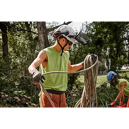 Worker wearing the BOLT Full Face Shield Metal Mesh for protection from debris