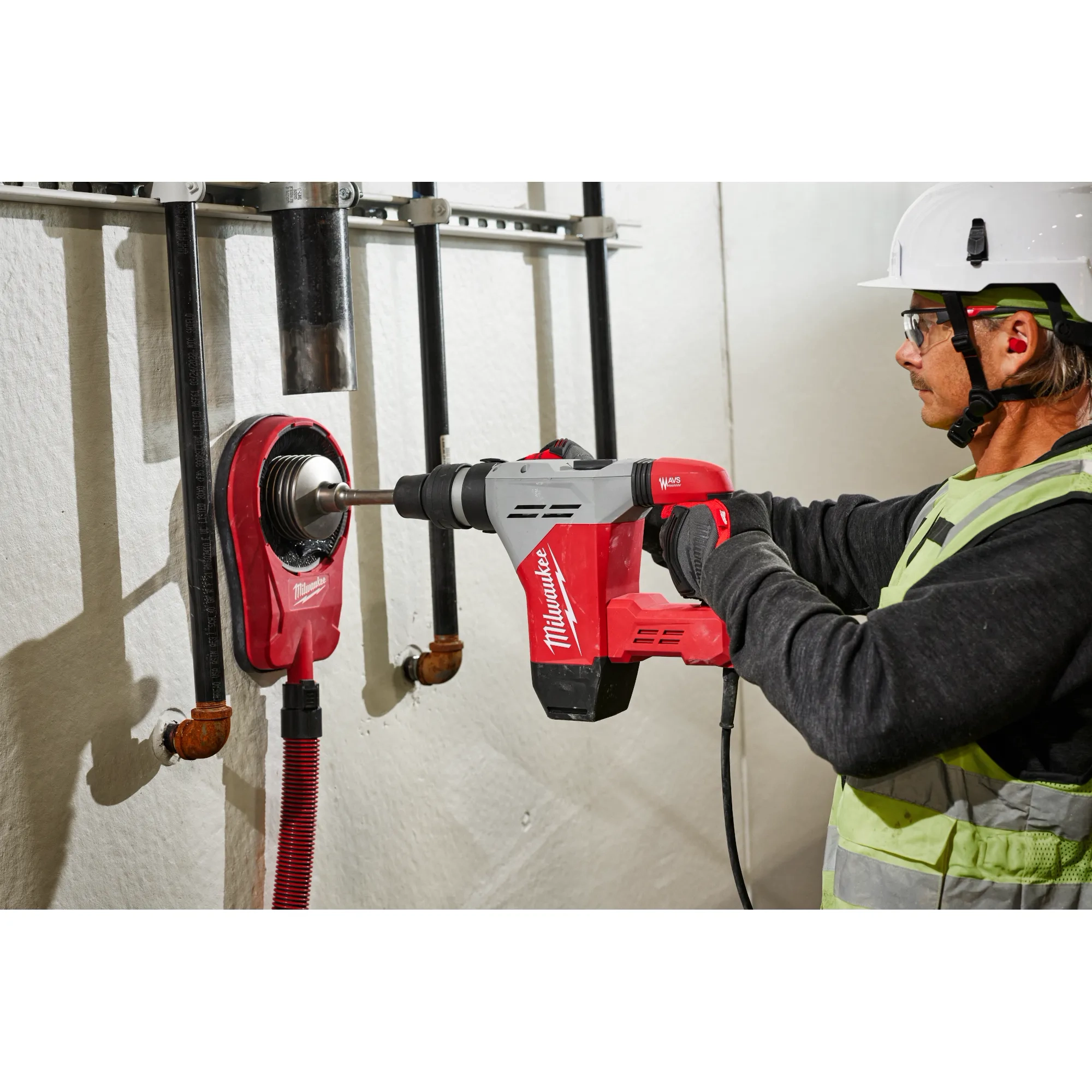 Image of the Milwaukee 1-9/16" SDS Max Rotary Hammer being used by a worker on a jobsite