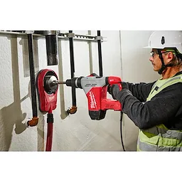 Image of the Milwaukee 1-9/16" SDS Max Rotary Hammer being used by a worker on a jobsite