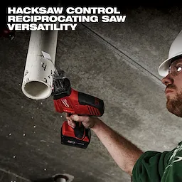 Person using a red M18 Cordless Reciprocating Saw from the M18 4-Tool Combo Kit to cut a pipe against a concrete ceiling. Text overlay reads "Hacksaw Control Reciprocating Saw Versatility."
