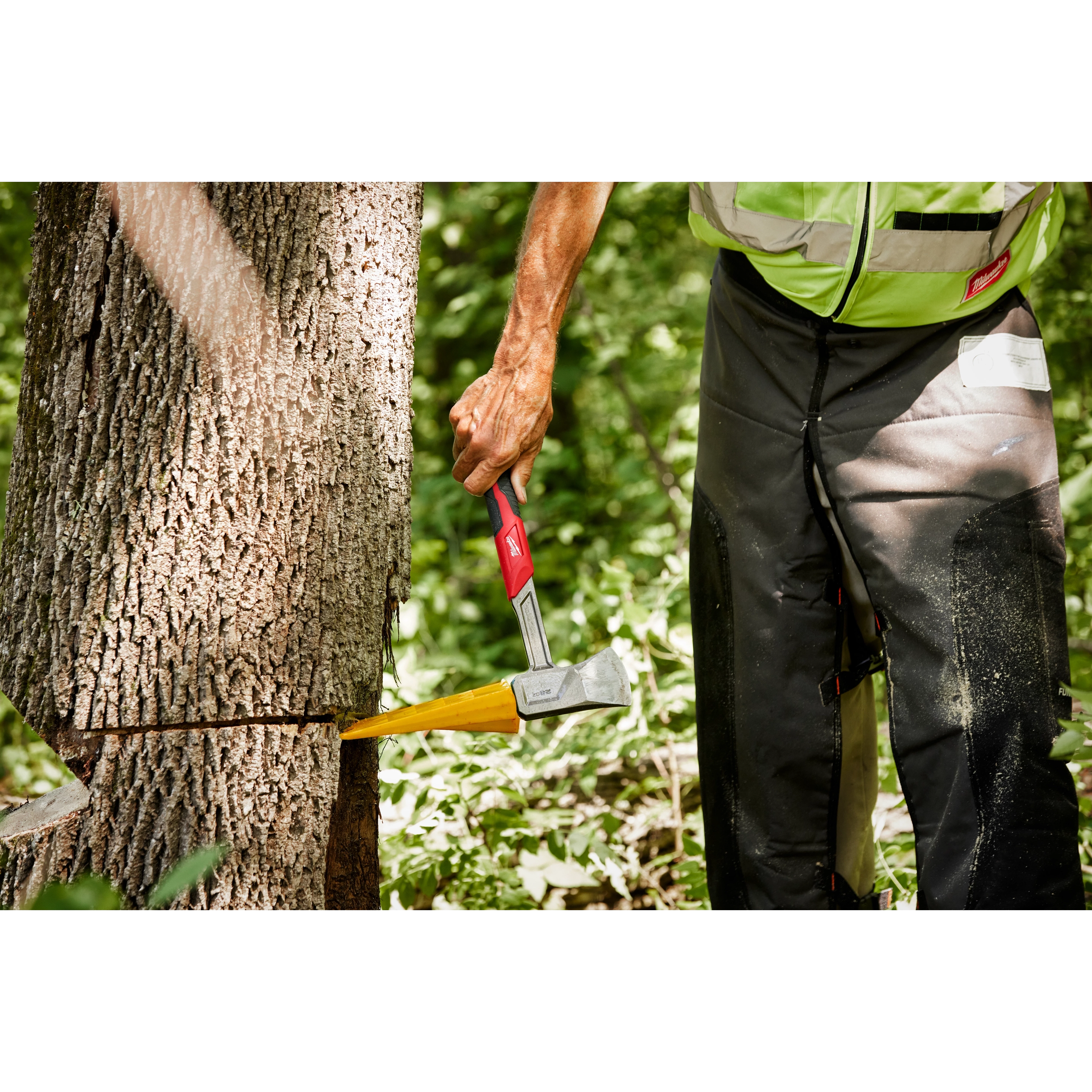 Worker using the 16” Splitting Axe