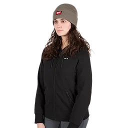 Image of a woman wearing the Milwaukee Rib-Knit Cuffed Beanie in brown