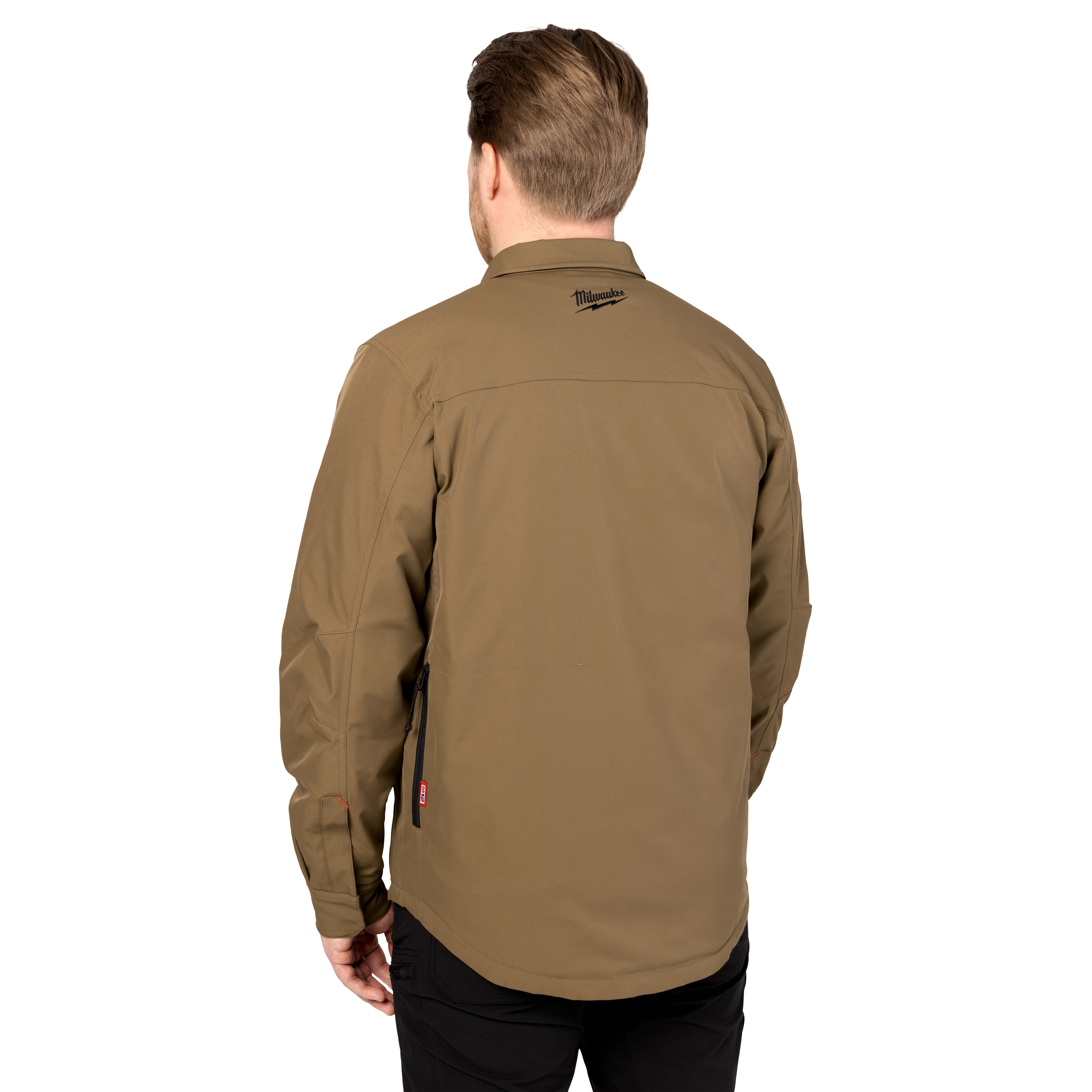 The M12 Shirt Jacket is shown in tan, viewed from the back. Features a fold-down collar, long sleeves.