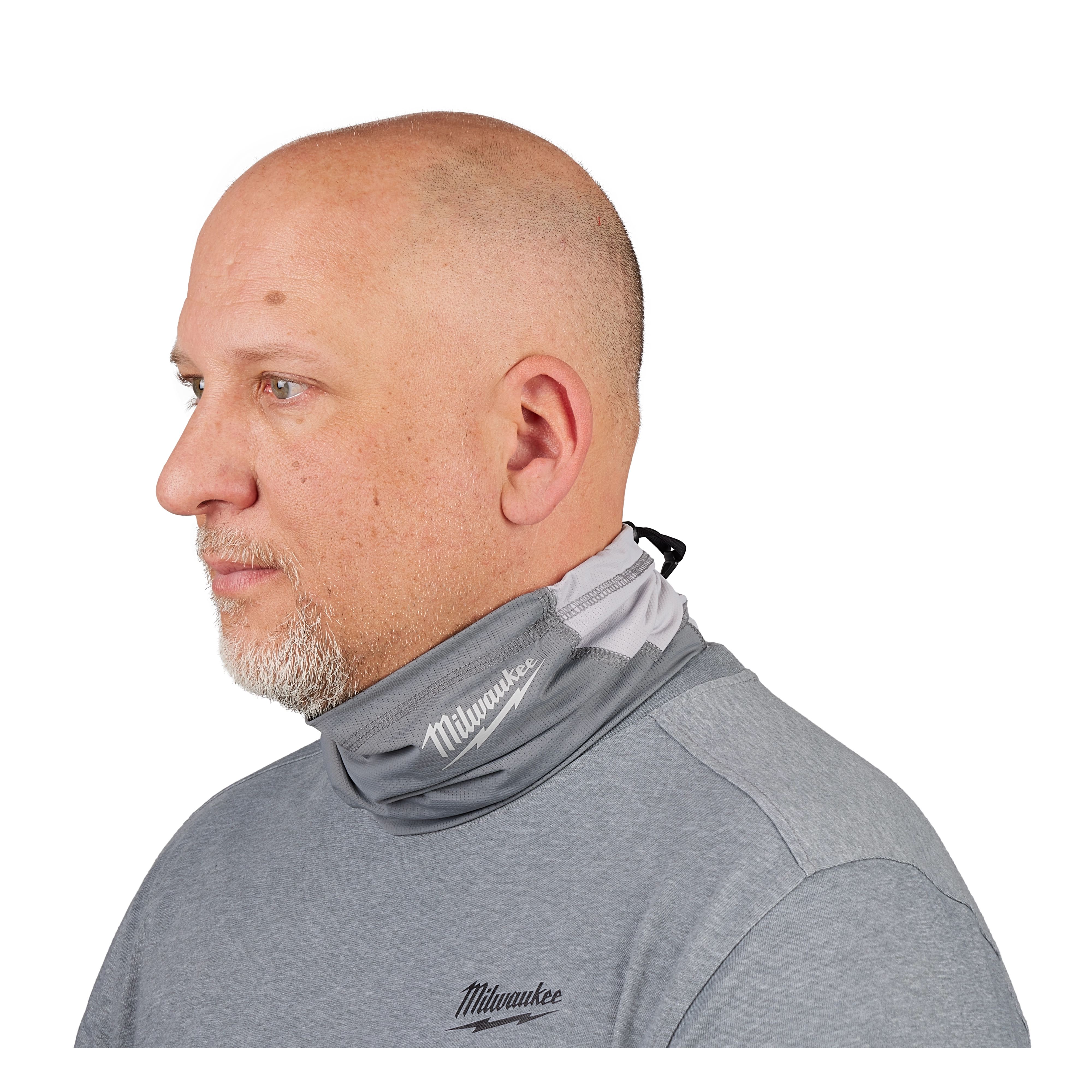 Side view of a person wearing a grey WORKSKIN Performance Neck Gaiter and a grey shirt with the same logo.