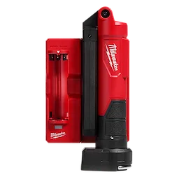 REDLITHIUM USB Stick Light with Magnet shown in red, includes charging dock. Black handle and lighting unit with Milwaukee logo.