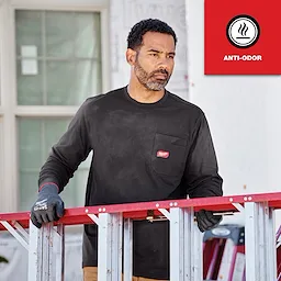 GRIDIRON Pocket T-Shirt - Long Sleeve. Black shirt with chest pocket. Individual holding a red and silver ladder. Anti-odor label visible.