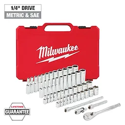 This image shows a Milwaukee 1/4" drive metric and SAE socket set in front of a red carrying case. The set includes multiple sockets, a ratchet, and extensions. The case features the Milwaukee logo. There is a "Lifetime Guarantee" badge shown in the lower left corner.