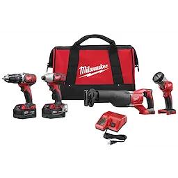 The M18 4 Piece Combo Kit, 2696-24 includes a drill driver, impact driver, reciprocating saw, work light, two batteries, charger, and a red carrying bag. All items feature the Milwaukee logo. The combo kit is designed for power tool efficiency and portability.