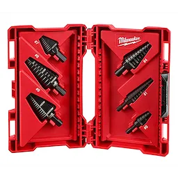The Step Drill Bit Set (6 PC) includes six black step drill bits organized inside a red plastic case. Each bit is marked with its size, ranging from #1 to #10. The case displays the Milwaukee brand name.