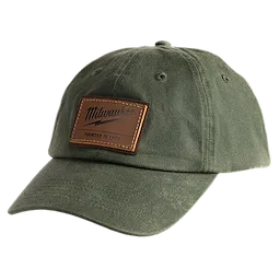 Waxed Canvas Adjustable Hat in green with a brown rectangular patch displaying "Founded in 1924" and a stylized signature logo.