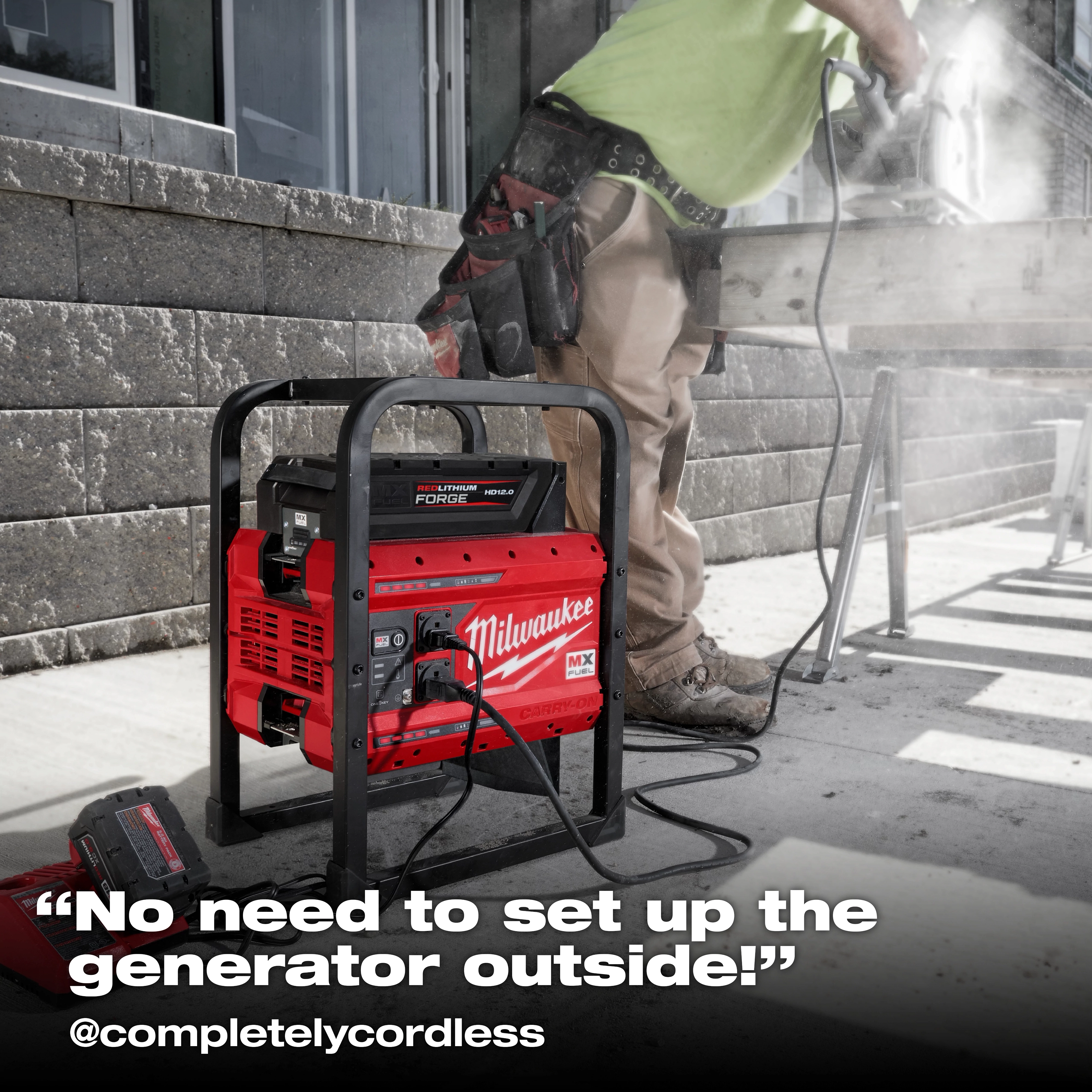 MX FUEL CARRY-ON 3600W/1800W Power Supply and Charger with MX FUEL REDLITHIUM FORGE HD12.0 on a jobsite walkway