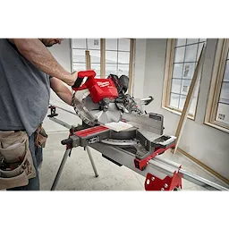 Image of the M18 FUEL™ 12” Dual Bevel Sliding Compound Miter Saw w/ ONE KEY™ being used on a jobsite