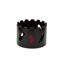 The Carbide Grit Hole Saw features a cylindrical black design with carbide grit along the cutting edge. Three oval-shaped side openings provide debris clearance. The red Milwaukee logo is prominently displayed on the side of the saw.