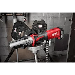 2½”- 4” IPS XL Ring Kit for M18 FORCE LOGIC Long Throw Press Tool displayed on a workbench with pressing attachments.