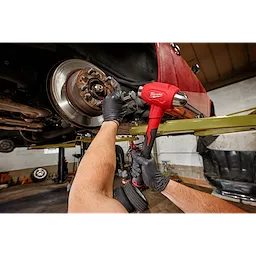 Worker using the 32oz Dead Blow Ball Peen Hammer for automotive use