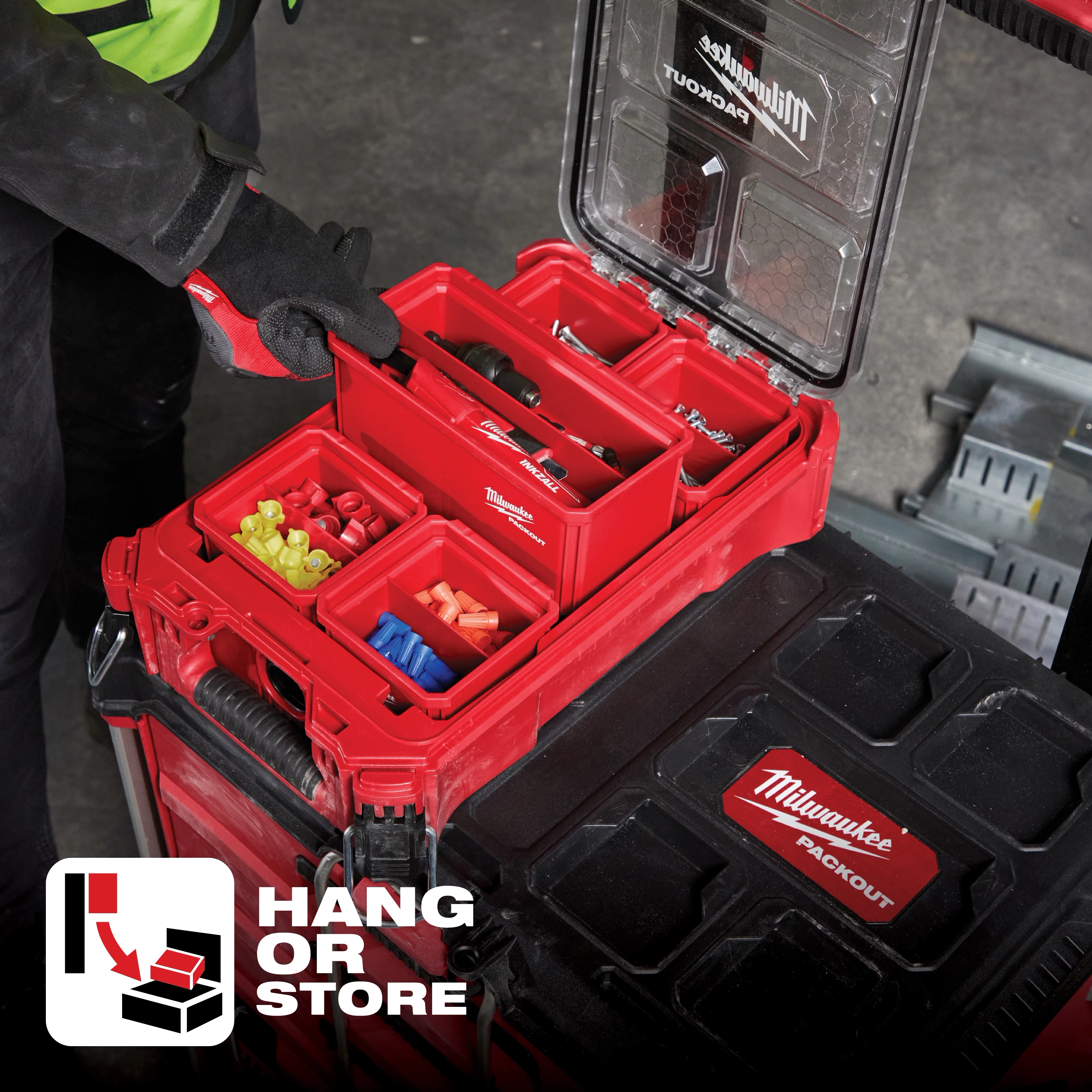 App%20Shot%20Overlay product displaying a red organizer toolbox filled with various small tools and parts, with "Hang or Store" text.