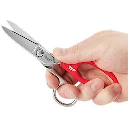Hand holding Electrician Scissors with Extended Handle, featuring a red handle and stainless steel blades with wire-cutting notches.