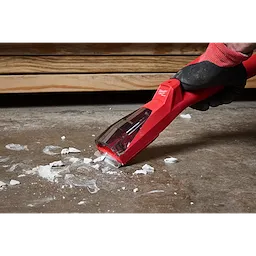 The AIR-TIP Debris Scraper is shown scraping debris off a concrete surface.