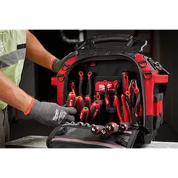 A person handles a set of tools inside a bag, featuring the 7pc SAE HollowCore Magnetic Nut Driver Set and 7pc SAE HollowCore Nut Driver Set.
