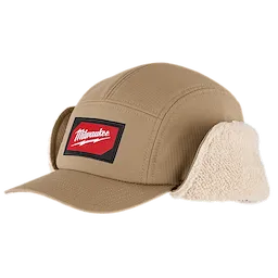 Sherpa-Lined Hat in tan with a red patch on the front. Features adjustable ear flaps lined with sherpa material.