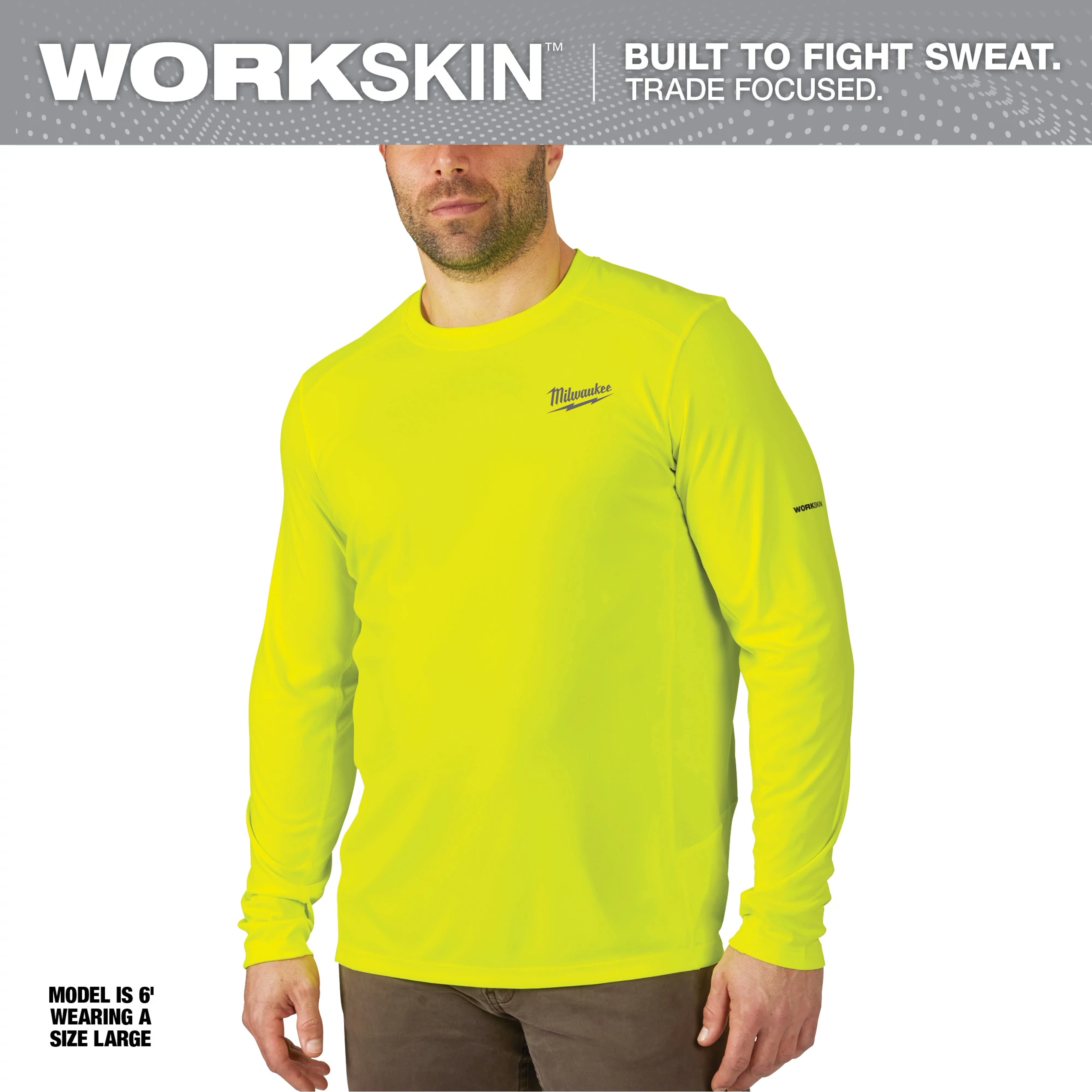 WORKSKIN Lightweight Performance Shirt - Long Sleeve, bright yellow color, with model wearing a size large, built to fight sweat.