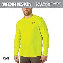WORKSKIN Lightweight Performance Shirt - Long Sleeve, bright yellow color, with model wearing a size large, built to fight sweat.