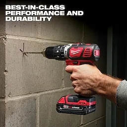 A person is using the M18 Cordless LITHIUM-ION 4-Tool Combo Kit drill to drill into a concrete wall. The drill is red and black with the text "BEST-IN-CLASS PERFORMANCE AND DURABILITY" above it.
