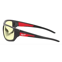 Performance Safety Glasses with yellow fog-free lenses, featuring a black frame with red accents and the Milwaukee logo on the side.