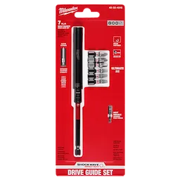 This image shows the SHOCKWAVE™ Impact Duty Magnetic Drive Guide Set - 7PC by Milwaukee. The set includes a magnetic drive guide and six screwdriver bits, all packaged in a red and white blister pack with detailed feature descriptions on the front.