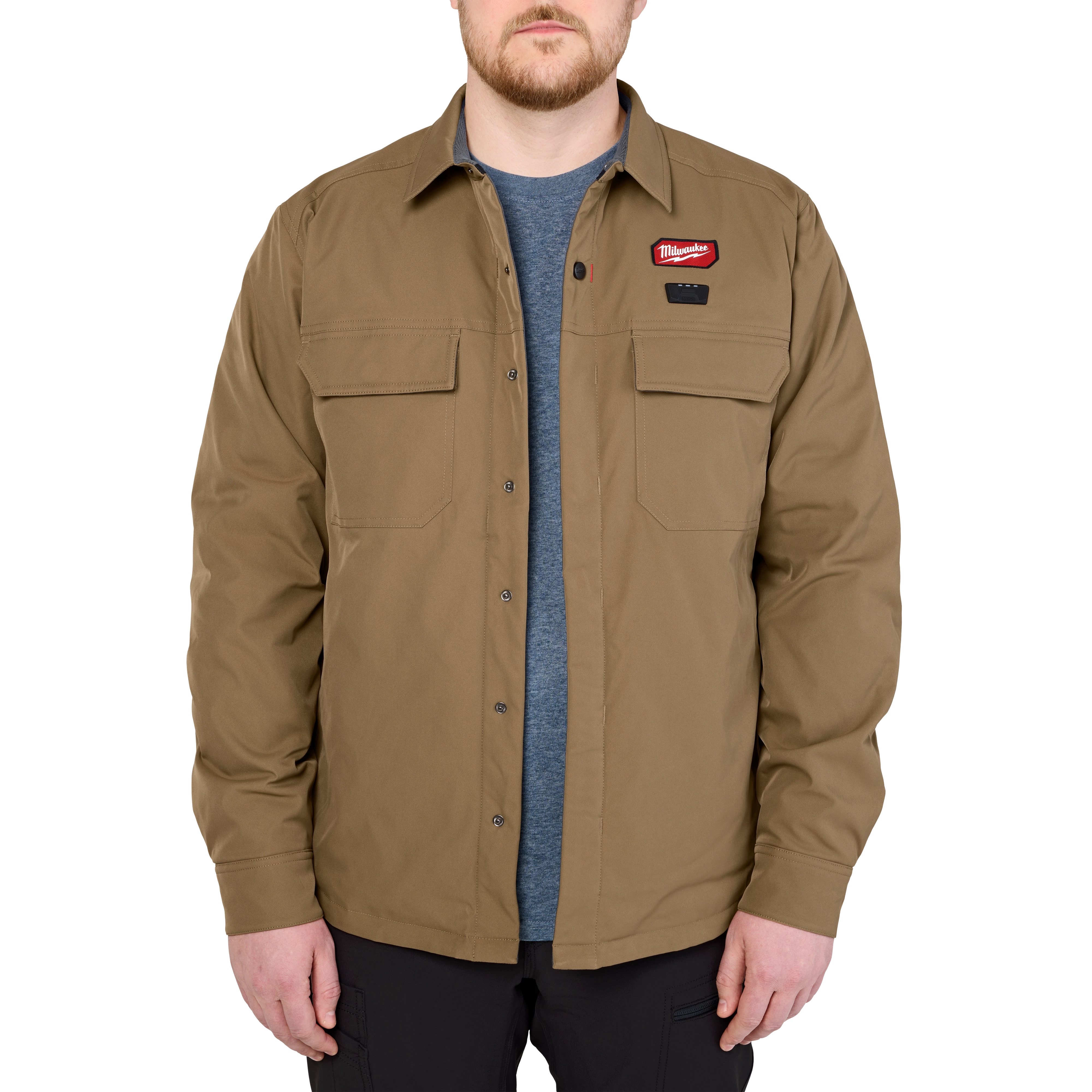 Man wearing the M12 Shirt Jacket in khaki color, with a blue undershirt.