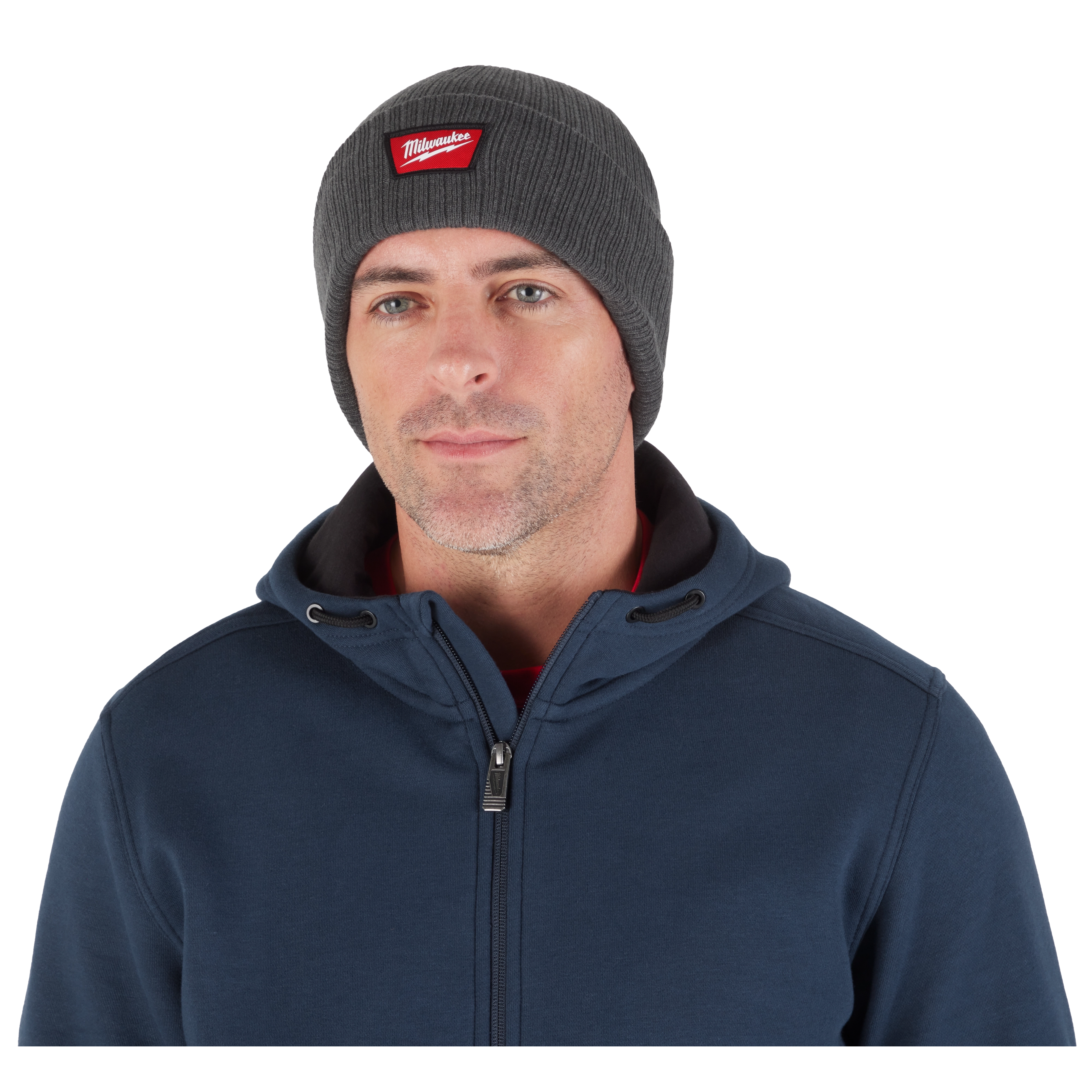 Image of a man wearing the Milwaukee Rib-Knit Cuffed Beanie in gray