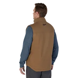 Man wearing the brown heavy duty sherpa-lined vest over the blue pullover hoodie