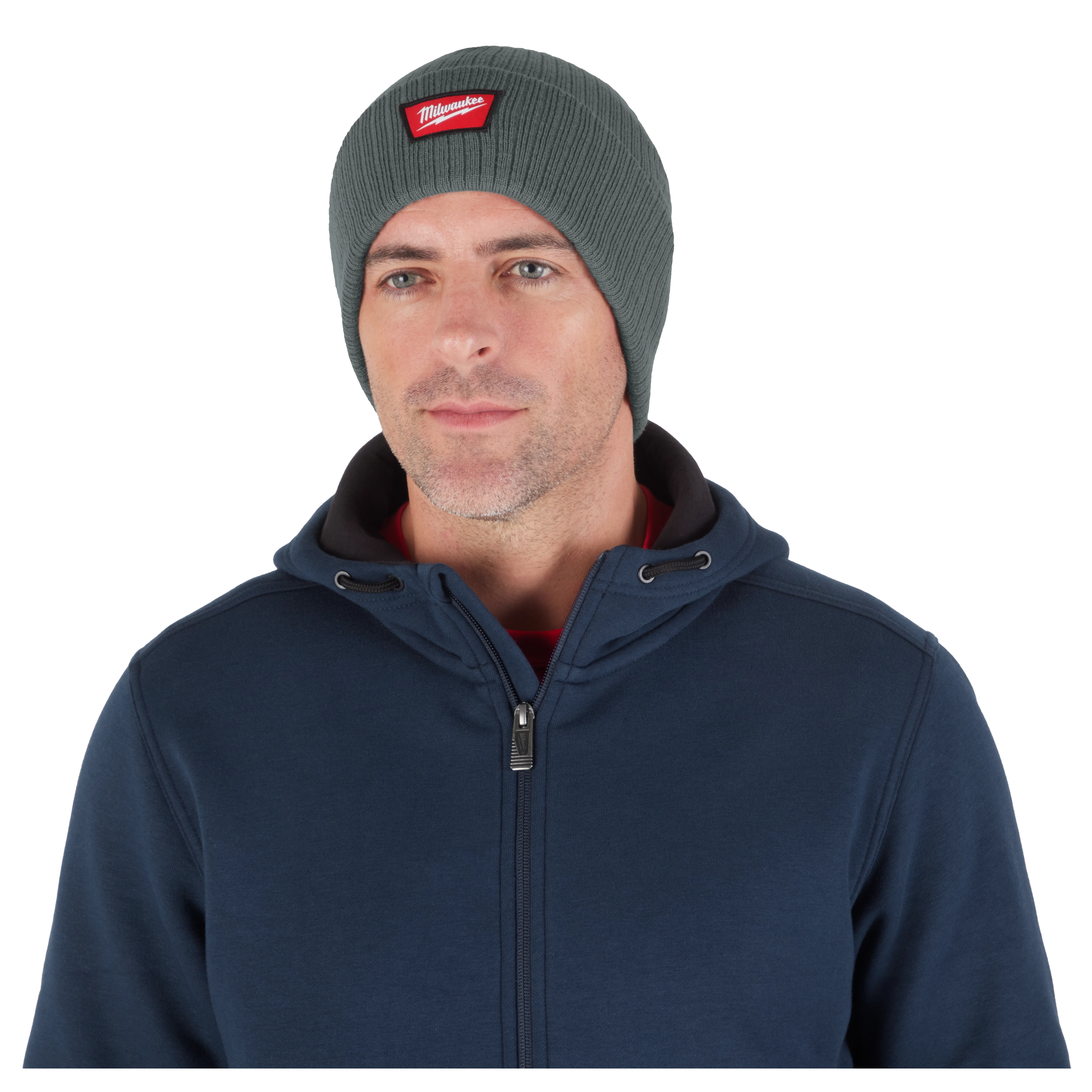 Image of a man wearing the Milwaukee Rib-Knit Cuffed Beanie in green