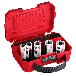 Red carrying case containing 7 PC HOLE DOZER AUTO KIT white circular saw blades and drill bits, designed for various drilling applications.