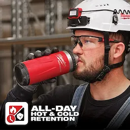 Worker holding a red App%20Shot%20Overlay thermal beverage container with "All-Day Hot & Cold Retention" text at the bottom.