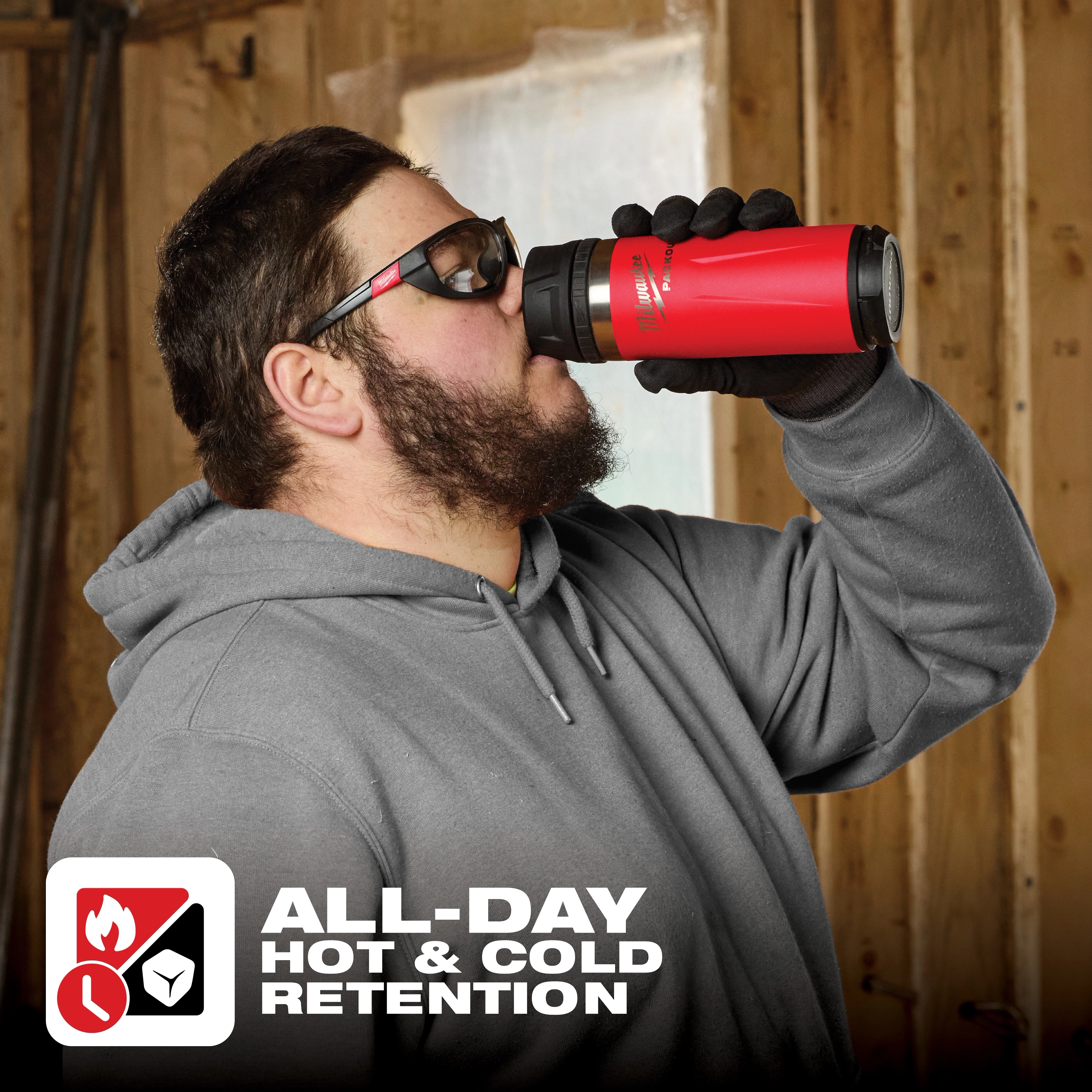Person drinking from a red PACKOUT 18oz Insulated Bottle with Sip Lid. Text reads, "ALL-DAY HOT & COLD RETENTION" with icons below.