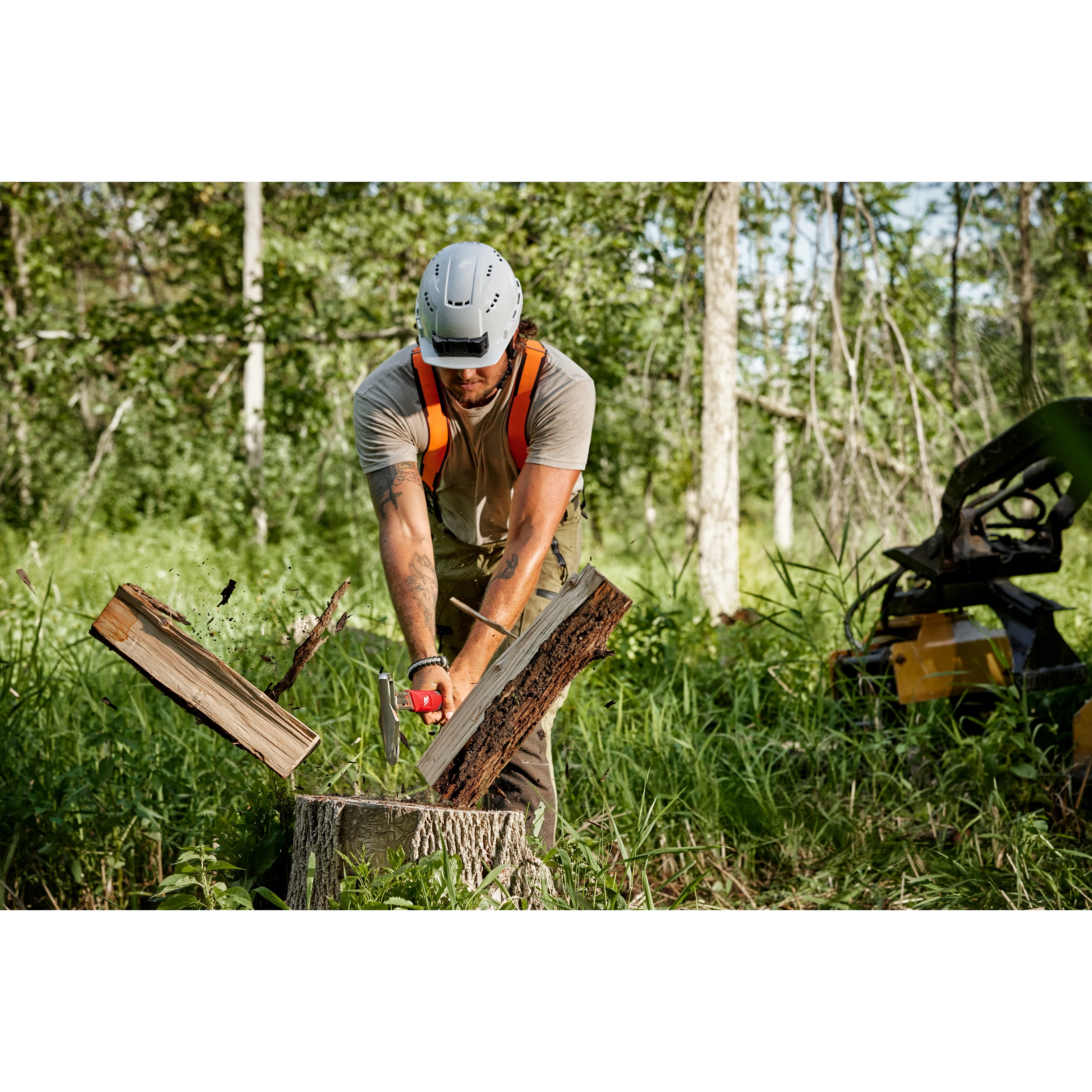 Worker using the 26” Splitting Axe