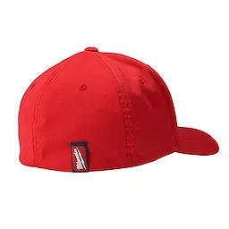 The Milwaukee Fitted Hat is bright red with a curved brim. A black label on the back features the Milwaukee logo.