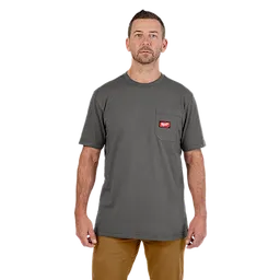 Heavy Duty Pocket T-Shirt in gray, featuring a left chest pocket with a red and white logo. Model is wearing brown pants.