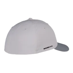 Grey WORKSKIN Performance Fitted Hat, side view, featuring ventilation eyelets and a curved bill. Brand logo is printed on the side.