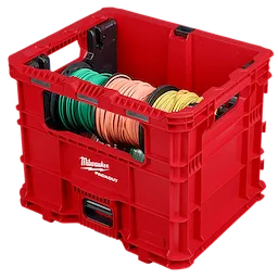 The PACKOUT Wire Pulling XL Crate is a red, heavy-duty storage crate with integrated handles and interior supports, designed for organizing spooled wires of various colors. Its stackable design features the Milwaukee logo on the front.