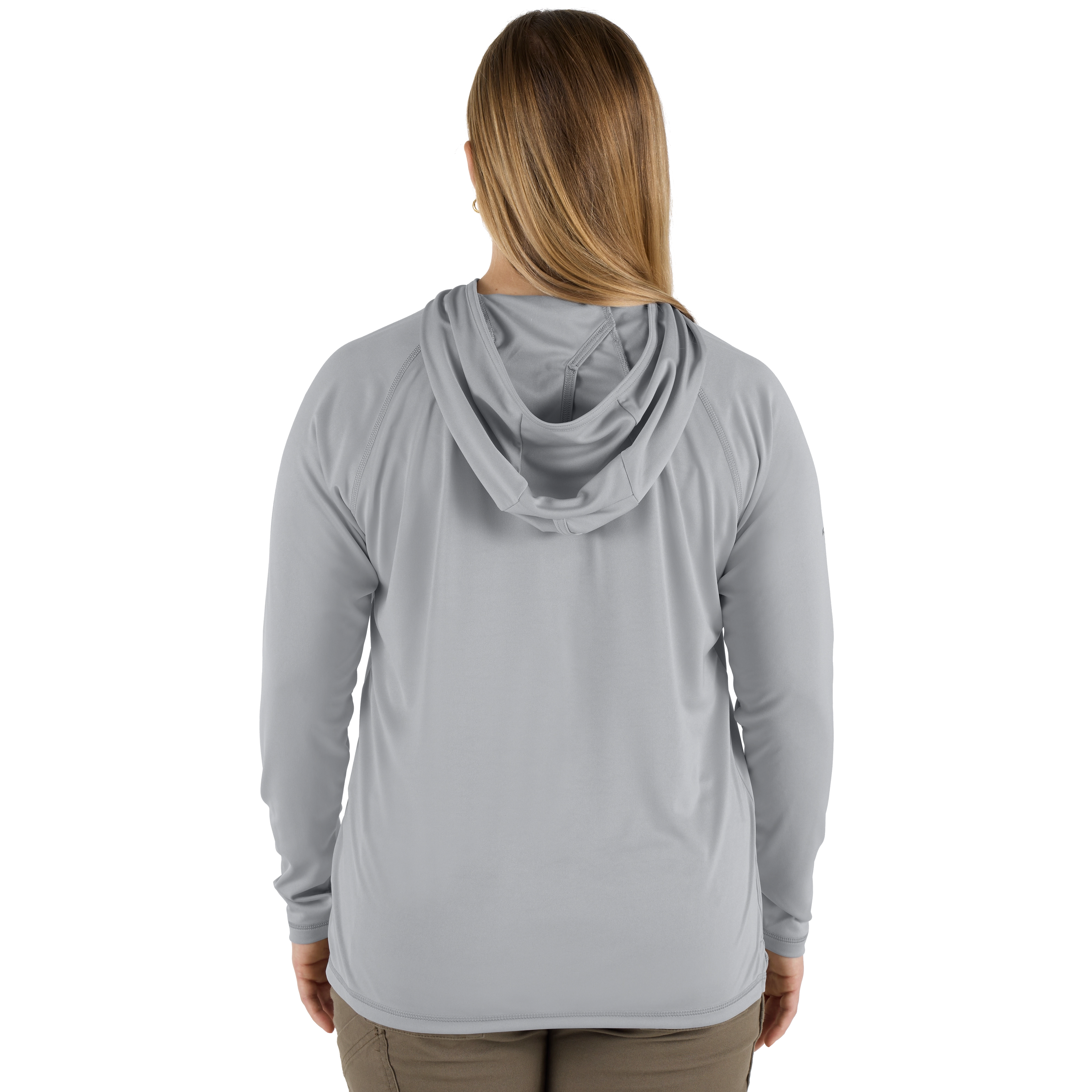 The image features the back view of a person wearing the Women's WORKSKIN Hooded Sun Shirt – Gray. The shirt includes a hood and long sleeves, designed for sun protection, and is paired with khaki pants.