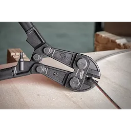 18" Bolt Cutter with black handles cutting through a thick metal cable atop a light-colored surface.