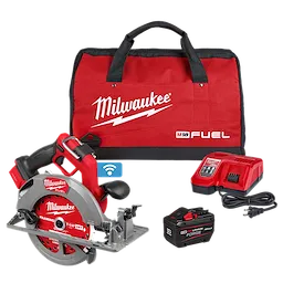 The image shows a Milwaukee M18 Fuel cordless circular saw kit. It includes a red and black saw, a red battery charger, a 12.0Ah battery, and a red carrying bag with black handles. The saw and bag display the Milwaukee logo.
