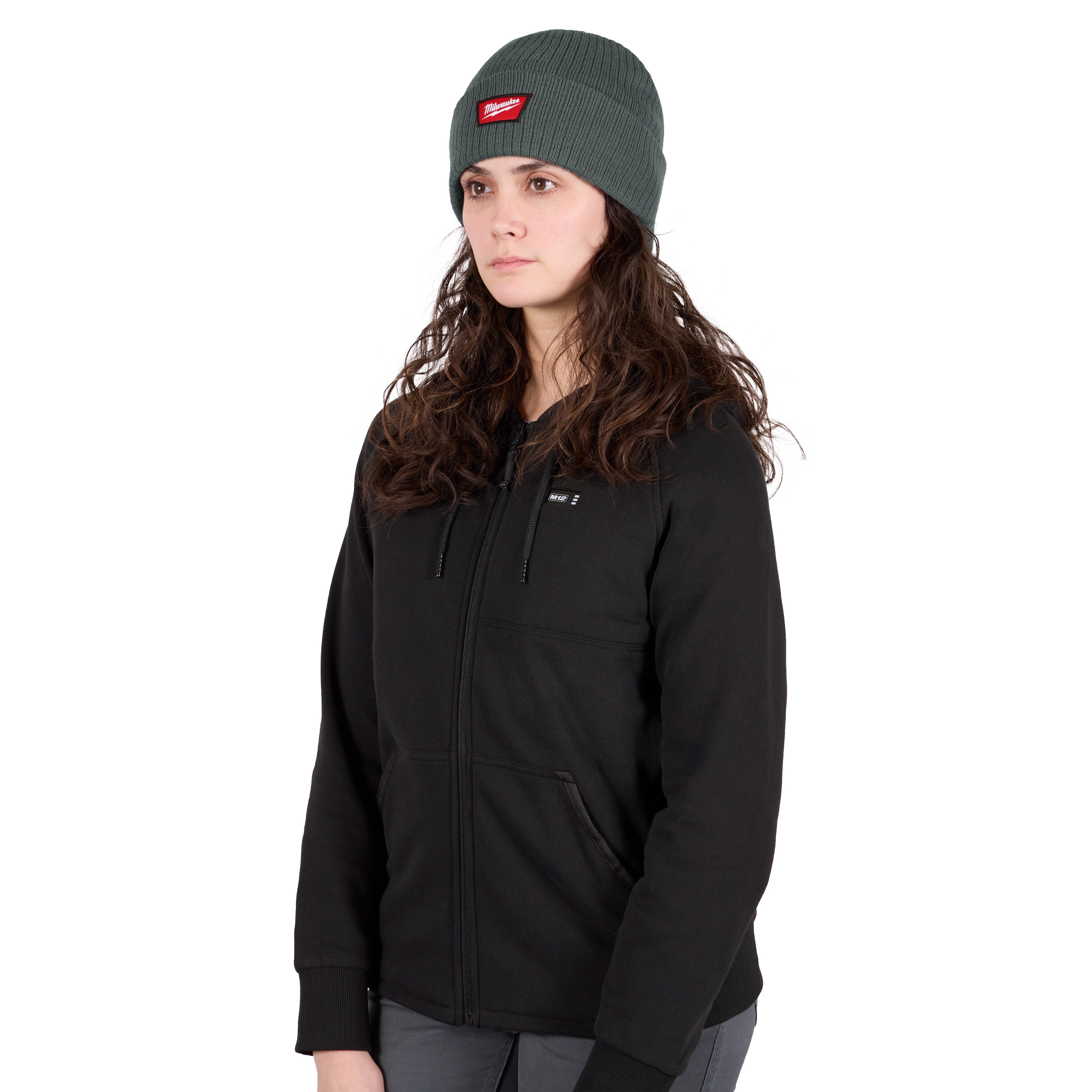 Image of a woman wearing the Milwaukee Rib-Knit Cuffed Beanie in green