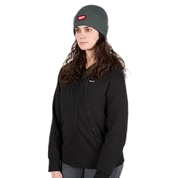 Image of a woman wearing the Milwaukee Rib-Knit Cuffed Beanie in green