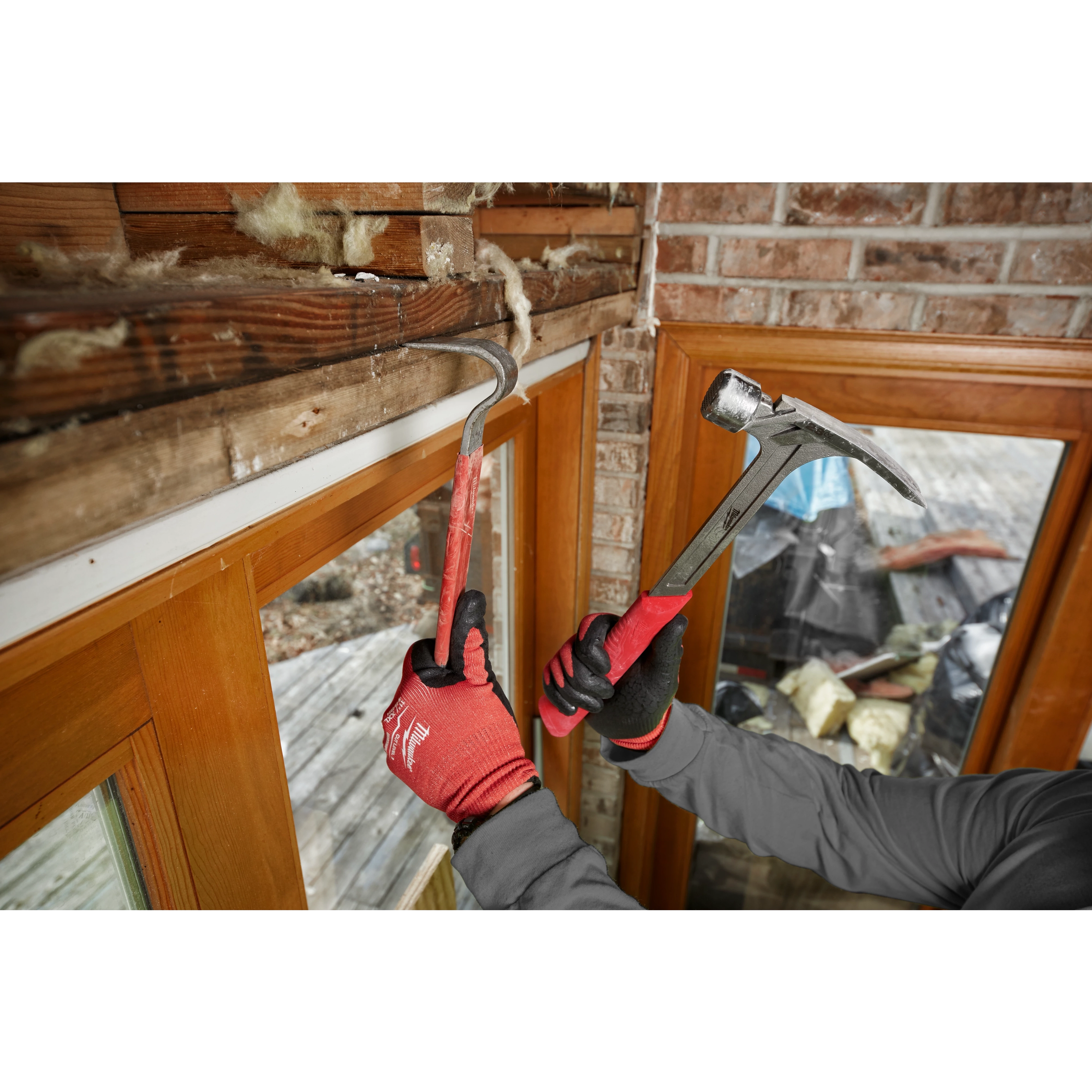 Worker using the Hammer Expansion on the jobsite
