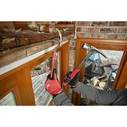 Worker using the Hammer Expansion on the jobsite