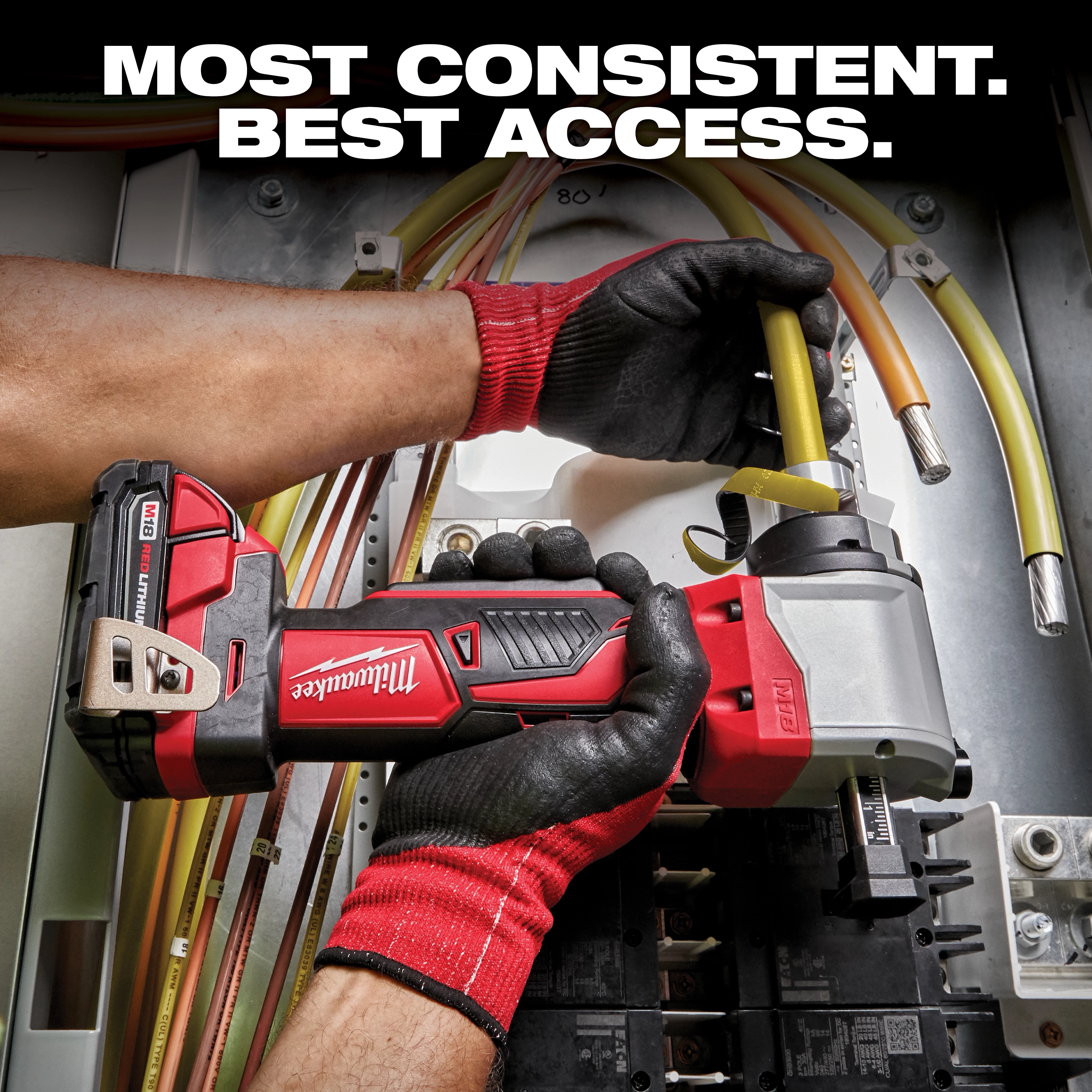 A worker wearing black and red gloves uses a Milwaukee cordless power tool to manipulate yellow wires in an electrical box. Text above the image reads: "Most consistent. Best access." The tool has a black and red body and a silver head.