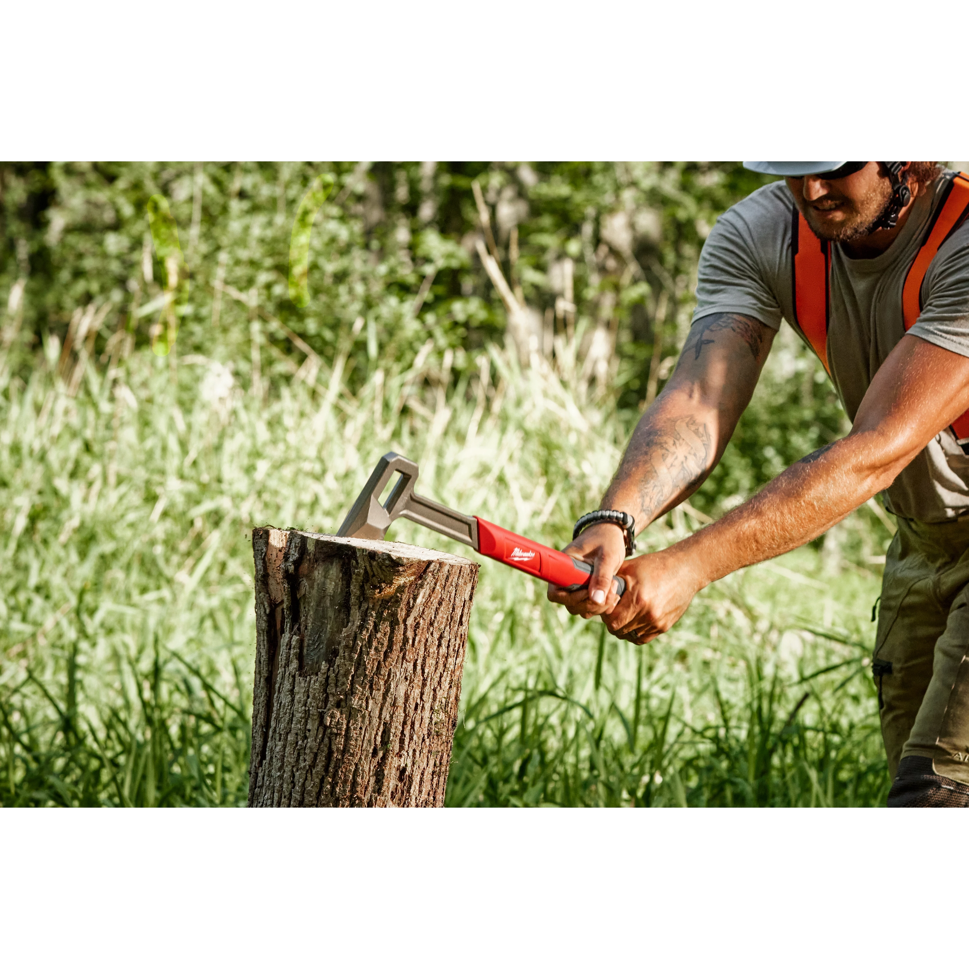 Worker using the 26” Splitting Axe